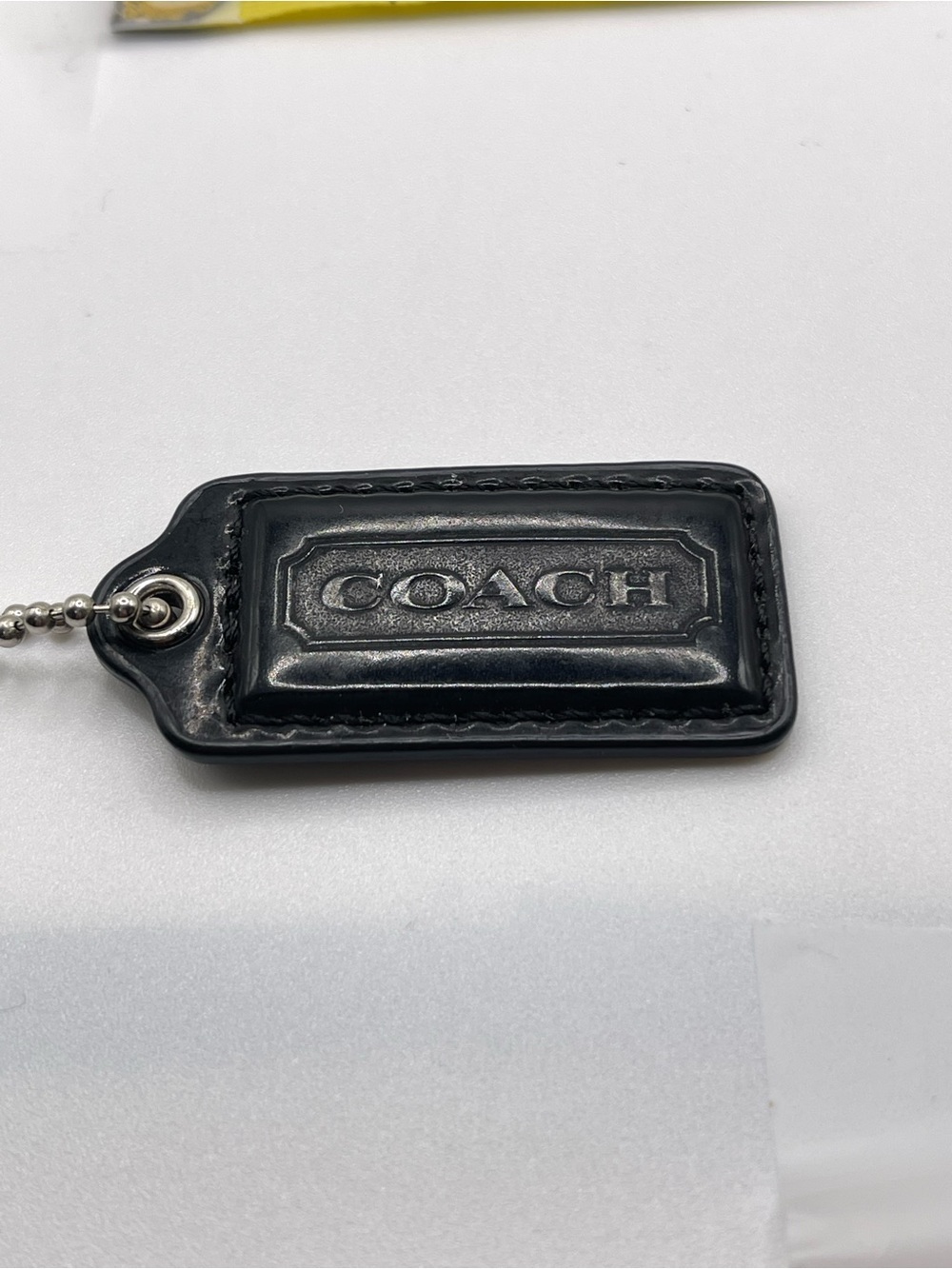 Coach Black Patent Leather Embossed Logo Hang Tag